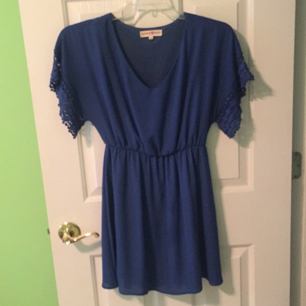 Blue dress. Lace trim on sleeves